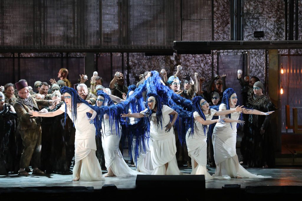 Yes, there are 6 women attached by one massive piece of blue hair.